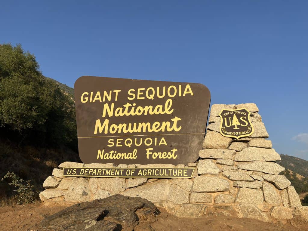 Entrance sign to Giant Sequoia National Monument in Sequoia National Forest, California